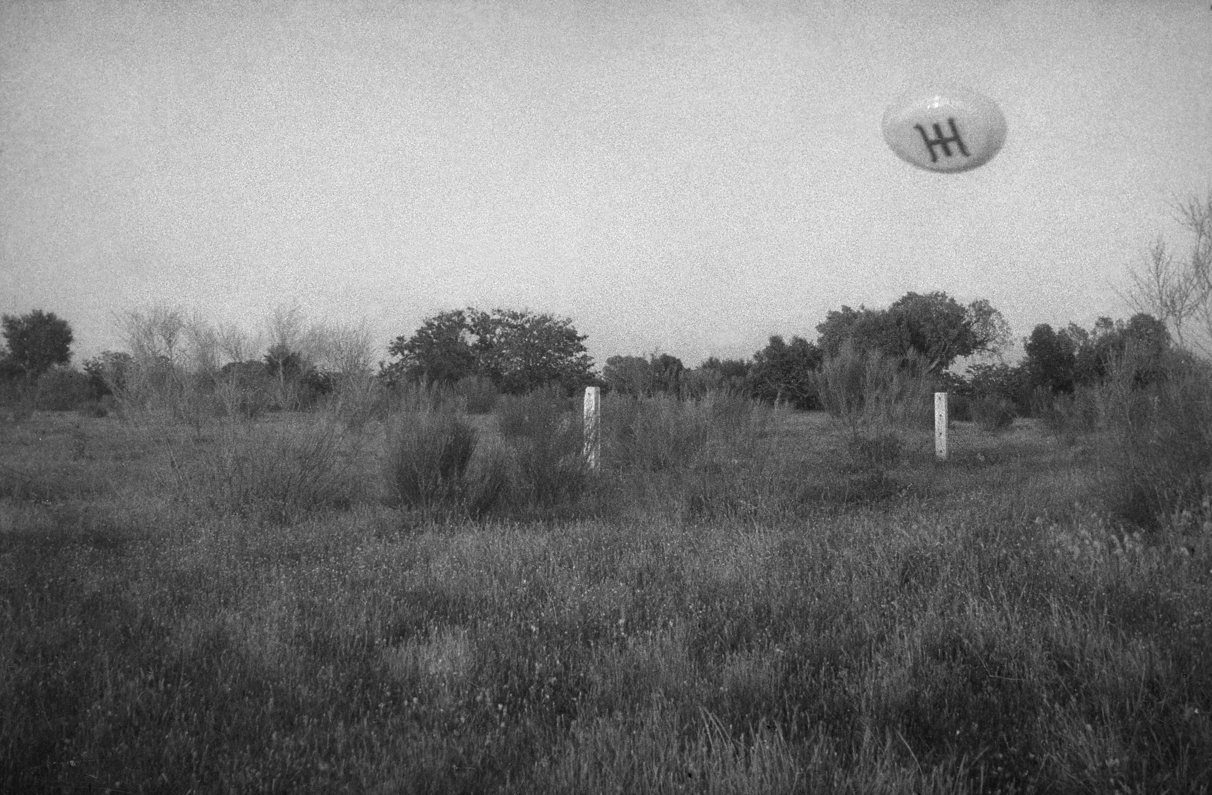 The famous San José de Valderas UFO photograph showing a flying saucer marked with the Ummo symbol.
