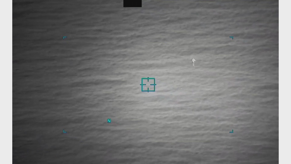 Actual declassified U.S. military infrared video frame showing a target lock on an inverted teardrop shape over the Gulf of Oman.