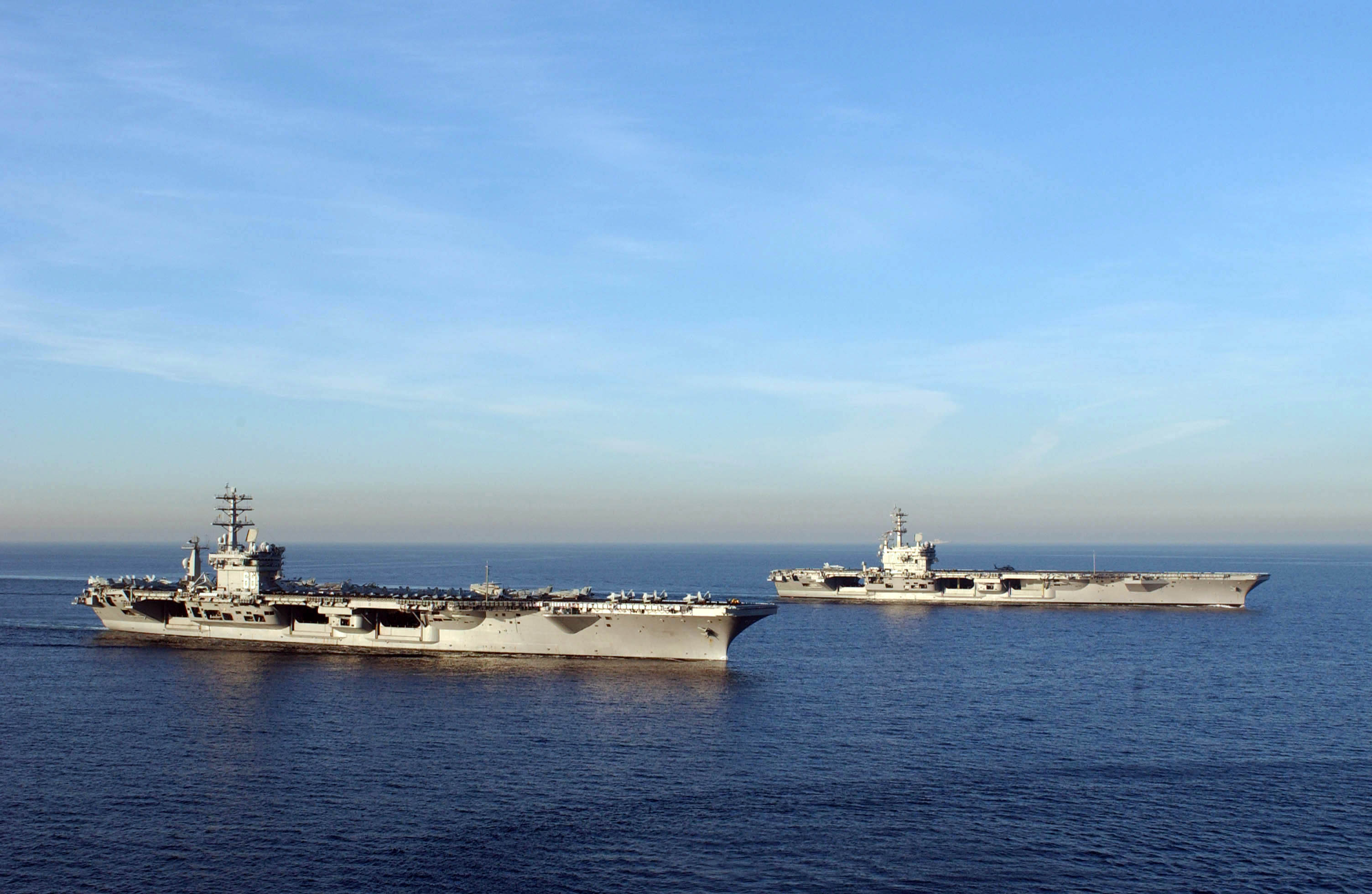 USS Nimitz and USS Ronald Reagan navigate during training exercises off Southern California on November 16, 2004.