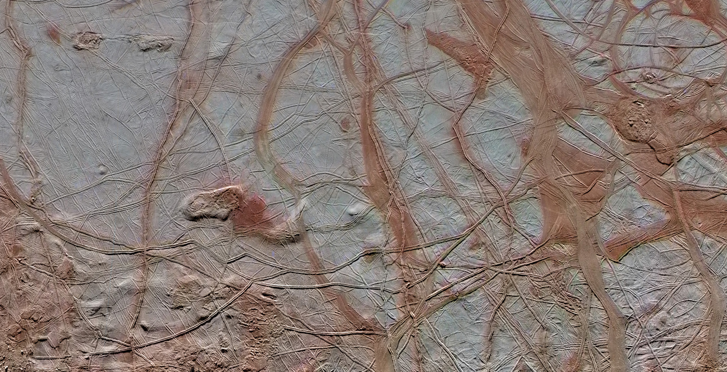 Galileo false-color view of Europa's Conamara Chaos region, a broken-ice terrain that is thought to overlie a liquid-water ocean beneath the moon's ice shell.