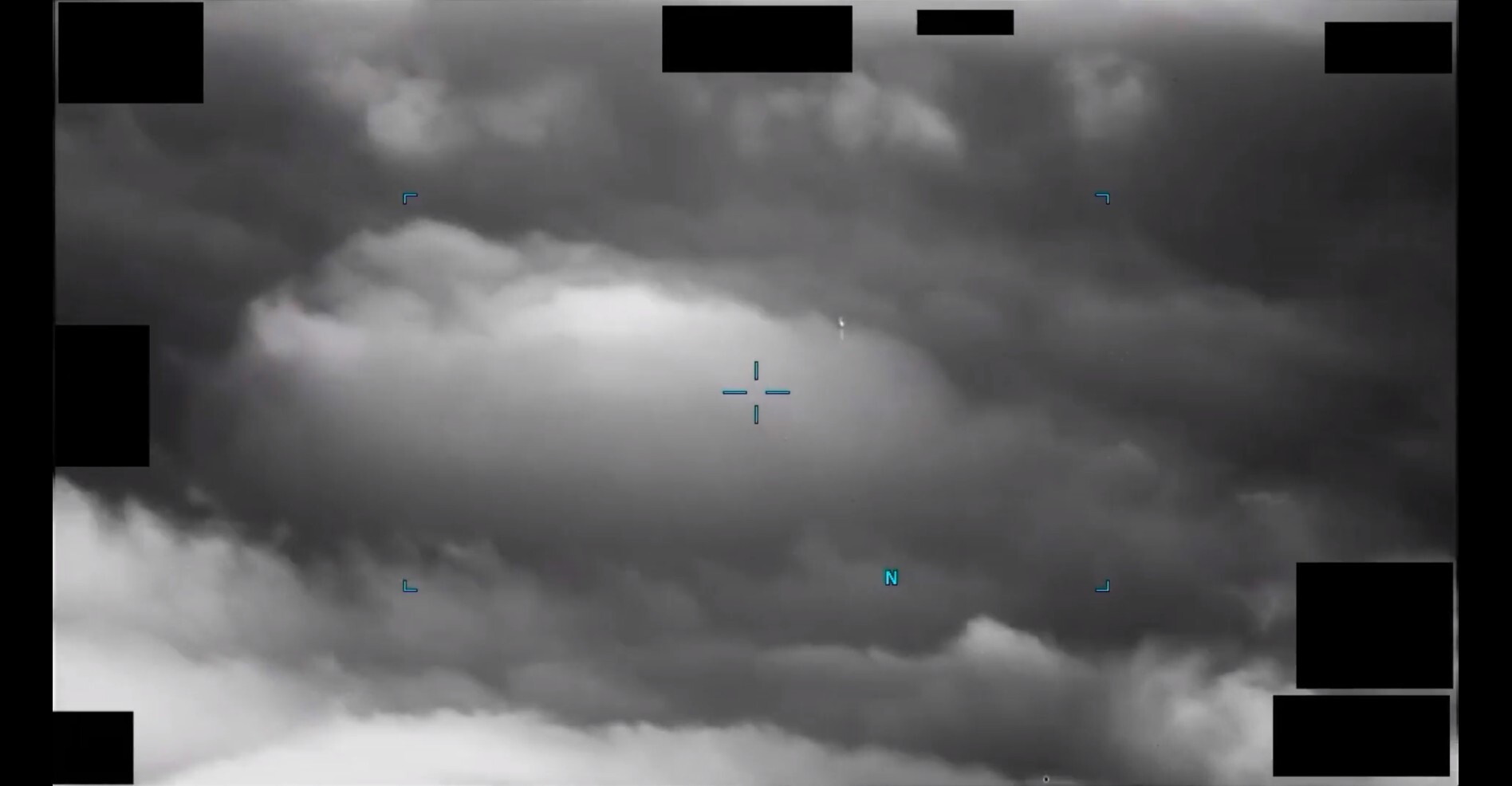 Official infrared still from DOW-UAP-PR105, showing an area of contrast against clouds over the East China Sea.