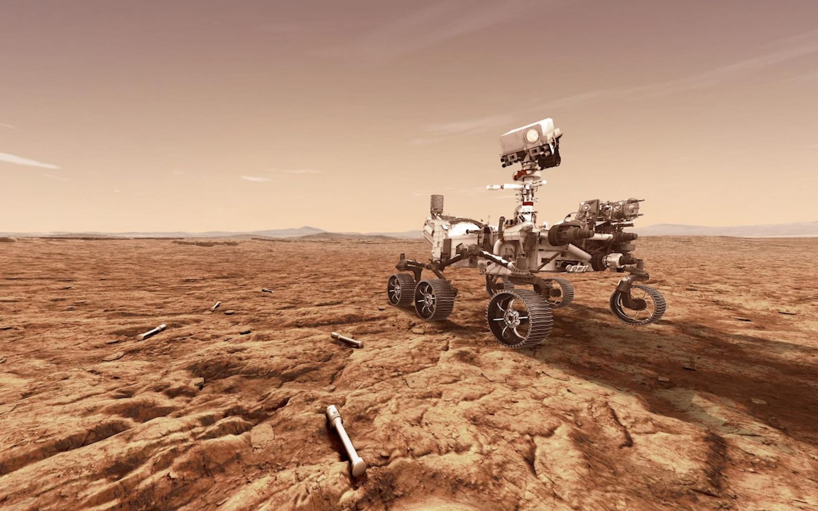 A technician inspects the Perseverance rover's sample caching assembly prior to flight integration. NASA/JPL-Caltech photo, public domain.