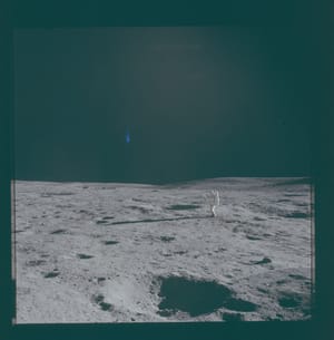 NASA Apollo 14 photograph AS14-66-9301, showing Edgar Mitchell on the lunar surface and the blue mark discussed in the article.