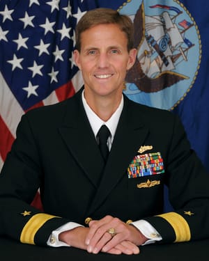 Official U.S. Navy portrait of Rear Admiral Timothy Gallaudet in dress uniform.
