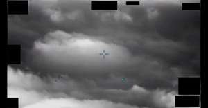 Official infrared still from DOW-UAP-PR105 showing an area of contrast against clouds over the East China Sea.