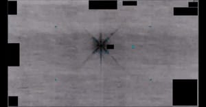 Official Department of War still from DOW-UAP-PR104, showing an infrared area of contrast described as resembling a six-pointed star.